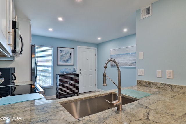 kitchen featuring sink and appliances with stainless steel finishes