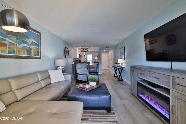 living room with light hardwood / wood-style floors