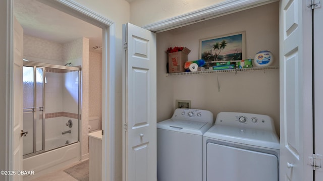 laundry room featuring laundry area and independent washer and dryer
