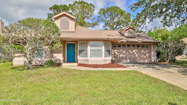 ranch-style home featuring roof with shingles, an attached garage, driveway, and a front lawn