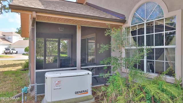 details featuring stucco siding and a power unit