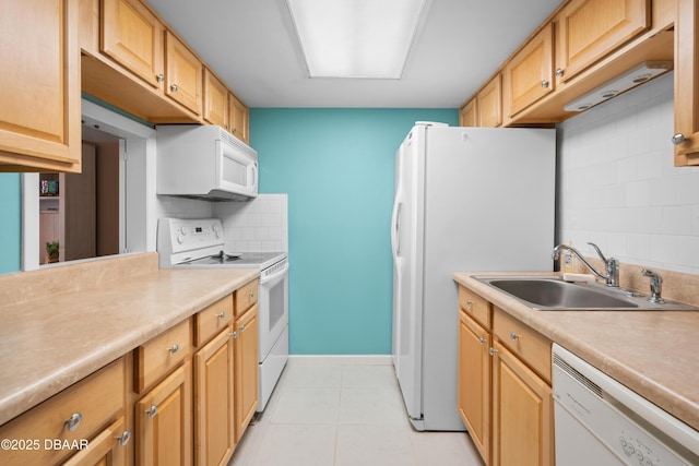 kitchen featuring backsplash, sink, white appliances, and light tile patterned flooring