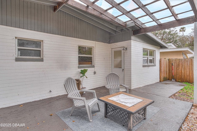 view of patio / terrace featuring a pergola and a fire pit