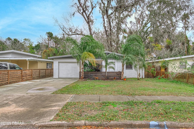 view of front facade with a garage and a front yard