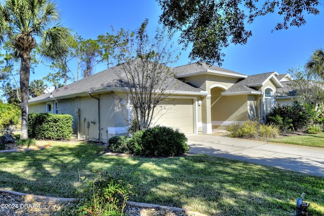 view of home's exterior featuring a yard and a garage