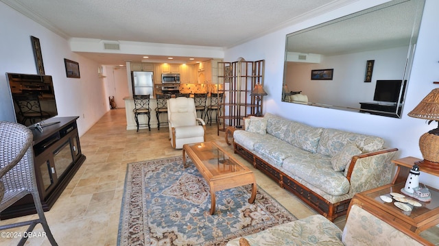2987 S Atlantic Ave Unit 506, Daytona Beach, FL 32118 - living room with crown molding and a textured ceiling