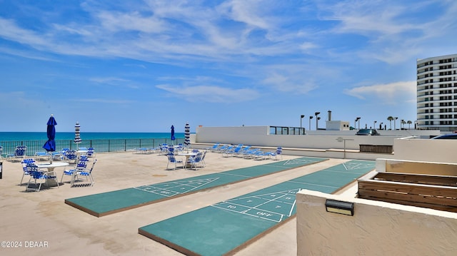 2987 S Atlantic Ave Unit 506, Daytona Beach, FL 32118 - surrounding community with shuffleboard and a water view
