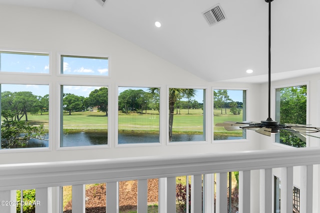 unfurnished sunroom with a water view and a healthy amount of sunlight