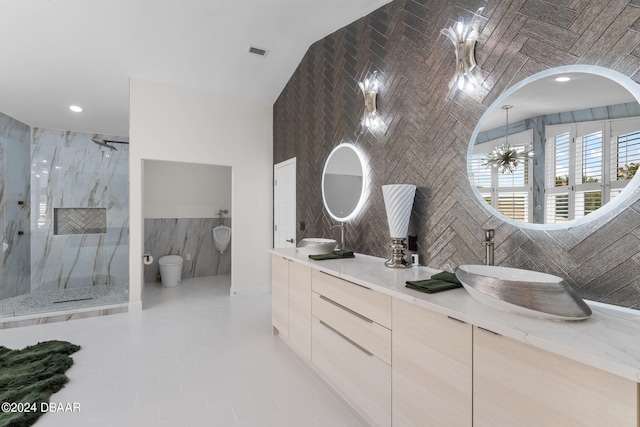 bathroom featuring toilet, tile walls, tile patterned flooring, and a shower with shower door