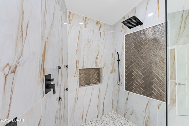 bathroom featuring tile walls and tiled shower