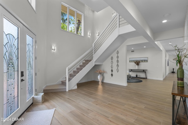 foyer with light hardwood / wood-style flooring