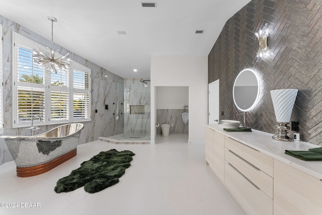 full bathroom featuring toilet, separate shower and tub, tile walls, a notable chandelier, and vanity