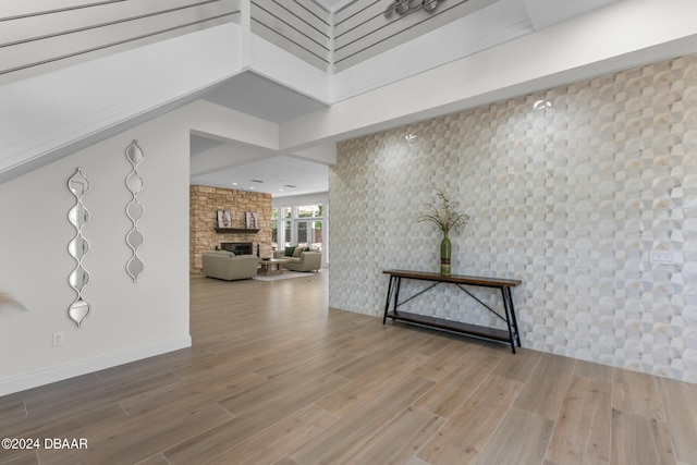 corridor featuring hardwood / wood-style floors