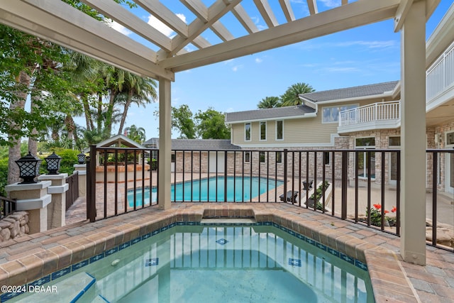 view of pool featuring a hot tub and a gazebo