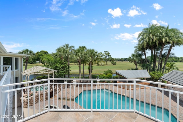 view of pool featuring a patio and a pergola