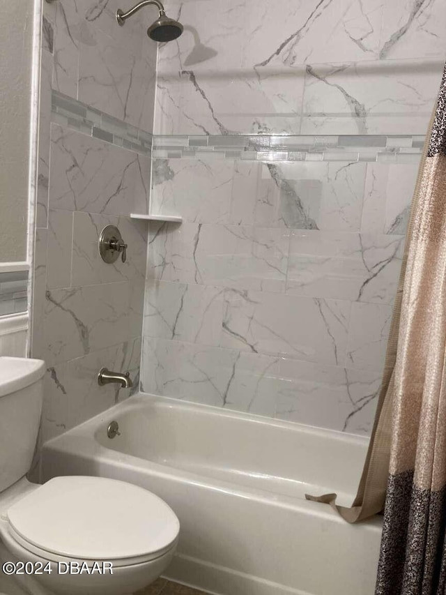 1401 S Palmetto Ave Unit 214, Daytona Beach, FL 32114 - full bathroom featuring toilet and shower / bath combo