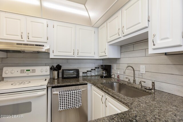 kitchen featuring under cabinet range hood, white cabinets, white electric range oven, and a sink