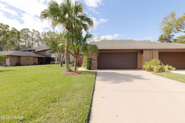 ranch-style house with a garage and a front lawn