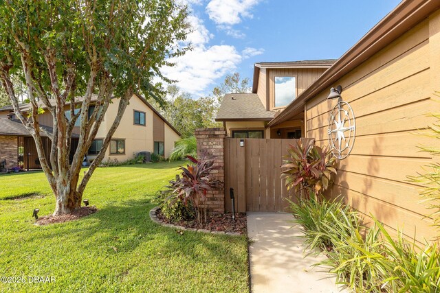 view of front of property with a garage and a front yard