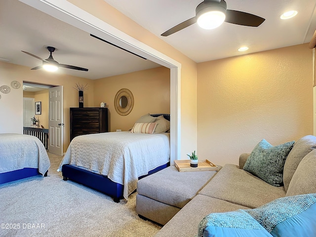 carpeted bedroom with ceiling fan