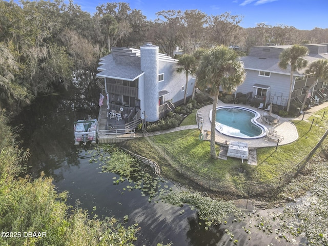 birds eye view of property featuring a water view