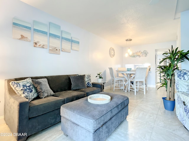 living room with a textured ceiling