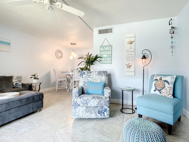 living room featuring ceiling fan