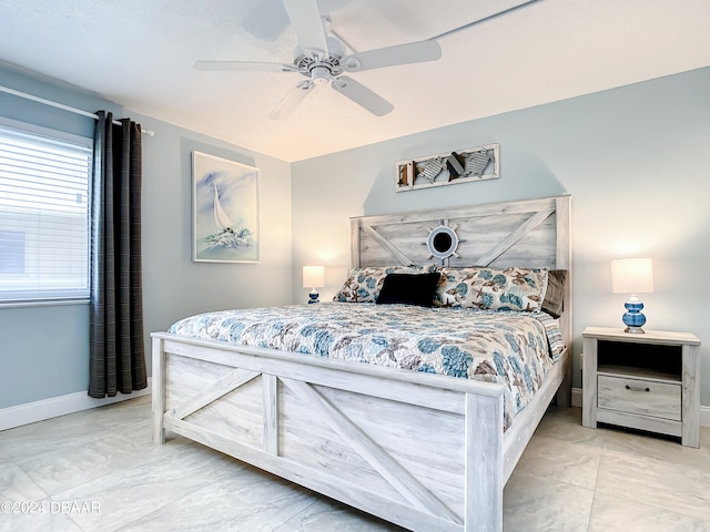 bedroom featuring ceiling fan