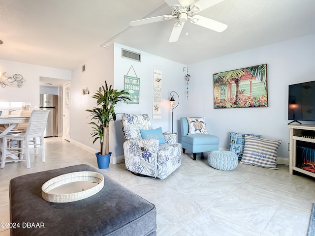 living room featuring ceiling fan