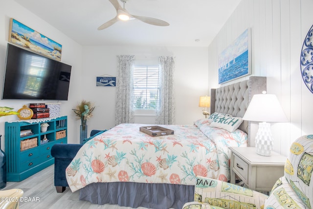 bedroom featuring ceiling fan and light hardwood / wood-style flooring