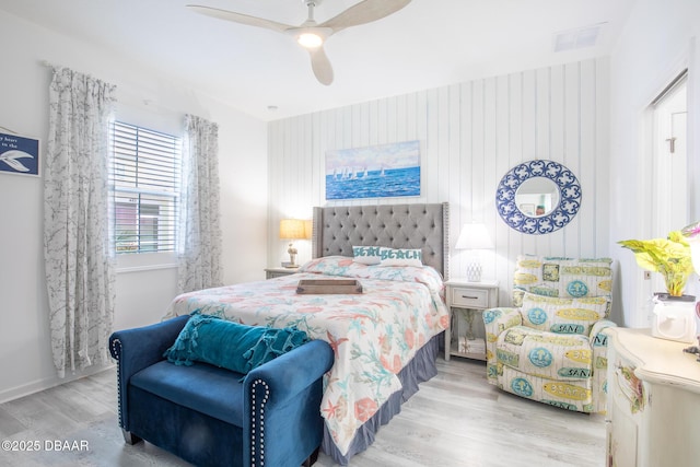 bedroom featuring ceiling fan and light wood-type flooring