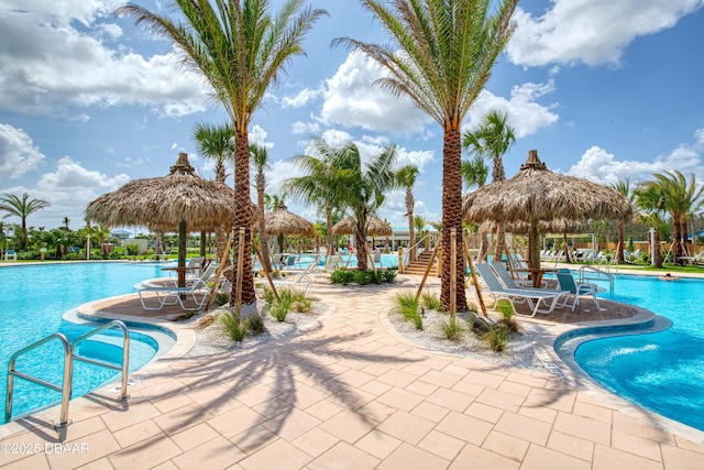 view of pool featuring a gazebo and a patio area