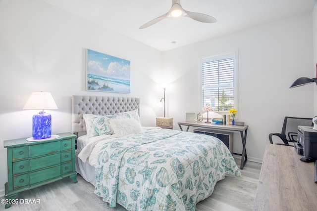 bedroom with ceiling fan and light hardwood / wood-style flooring