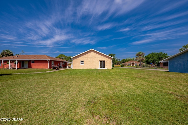 707 Hamilton St, New Smyrna Beach, FL 32168 - back of property with a yard