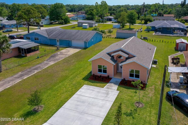 707 Hamilton St, New Smyrna Beach, FL 32168 - aerial perspective of suburban area