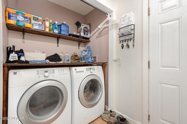 laundry area with washer and clothes dryer