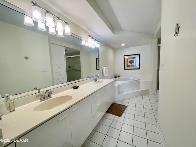 bathroom with vanity, shower with separate bathtub, and tile patterned floors