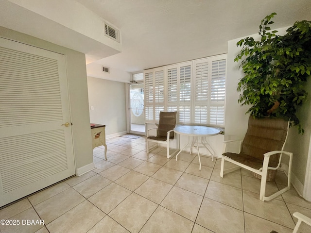 interior space with light tile patterned floors