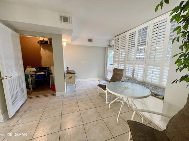 interior space featuring light tile patterned floors