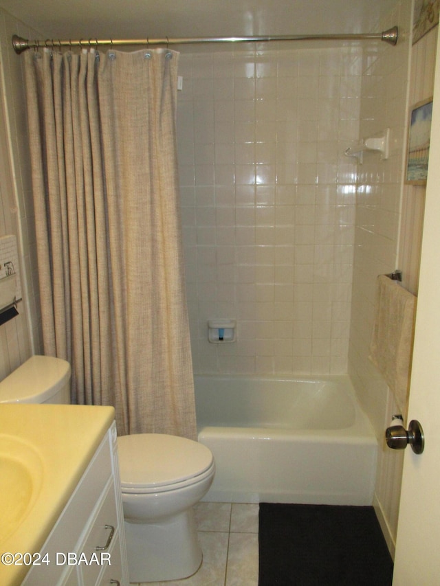 full bathroom with tile patterned floors, vanity, shower / bath combo, and toilet