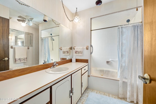 bathroom with vanity, shower / tub combo with curtain, and ceiling fan