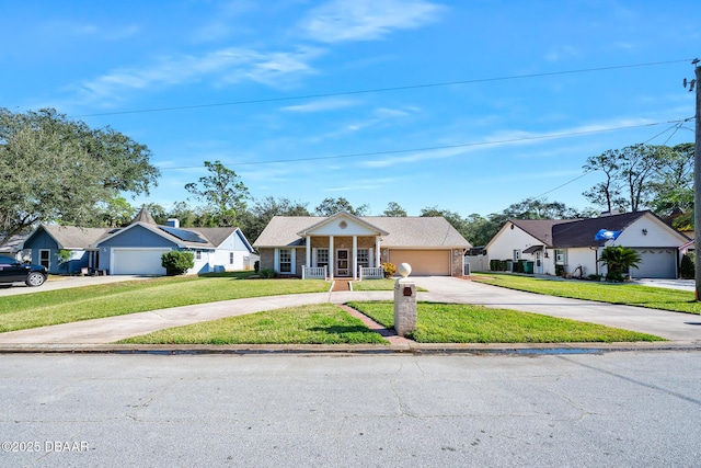 ranch-style house with a porch, a garage, and a front lawn