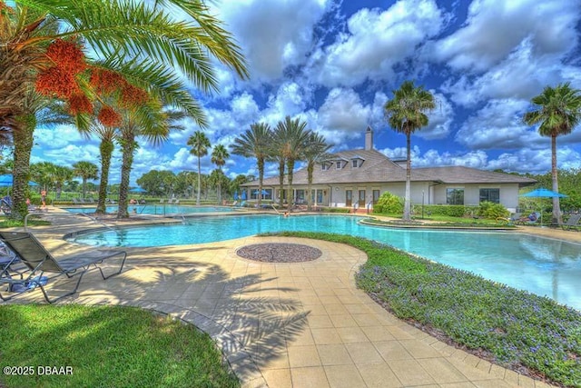 pool with a patio area