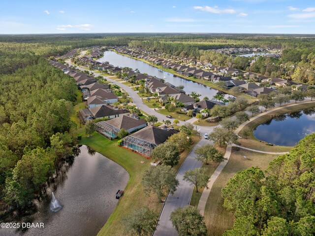 aerial view with a water view and a residential view