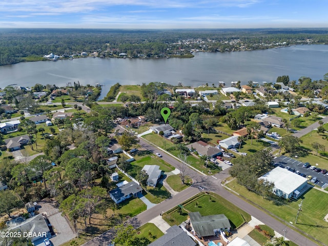 birds eye view of property featuring a water view