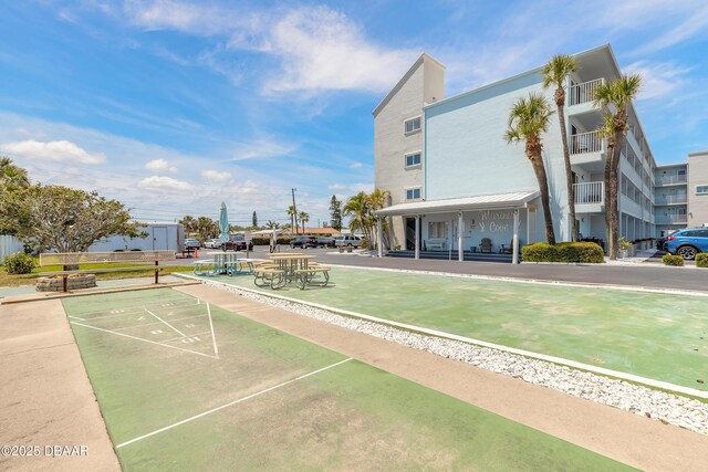 view of community with shuffleboard