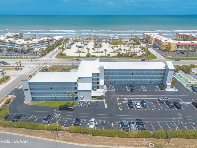 aerial view with a view of the beach and a water view