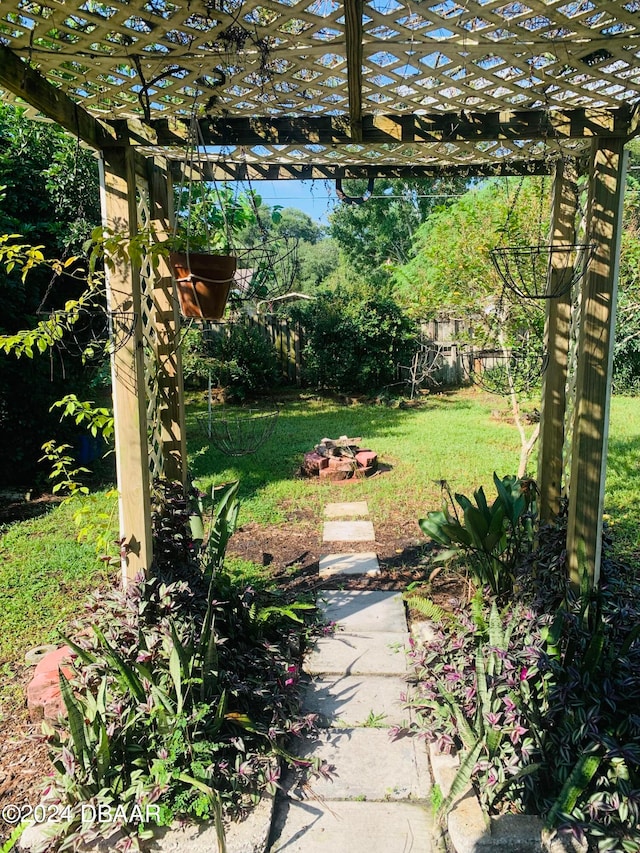 view of yard with a pergola