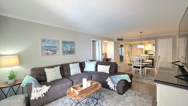 1275 Ocean Shore Blvd Unit 206, Ormond Beach, FL 32176 - living area featuring wood-type flooring and ornamental molding