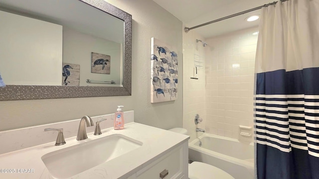 1275 Ocean Shore Blvd Unit 206, Ormond Beach, FL 32176 - full bath featuring toilet, vanity, shower / tub combo, and a textured wall